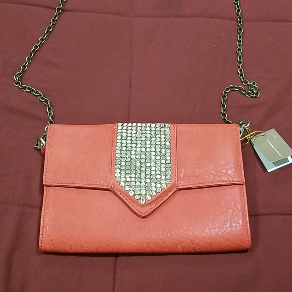 Studded faux-leather clutch